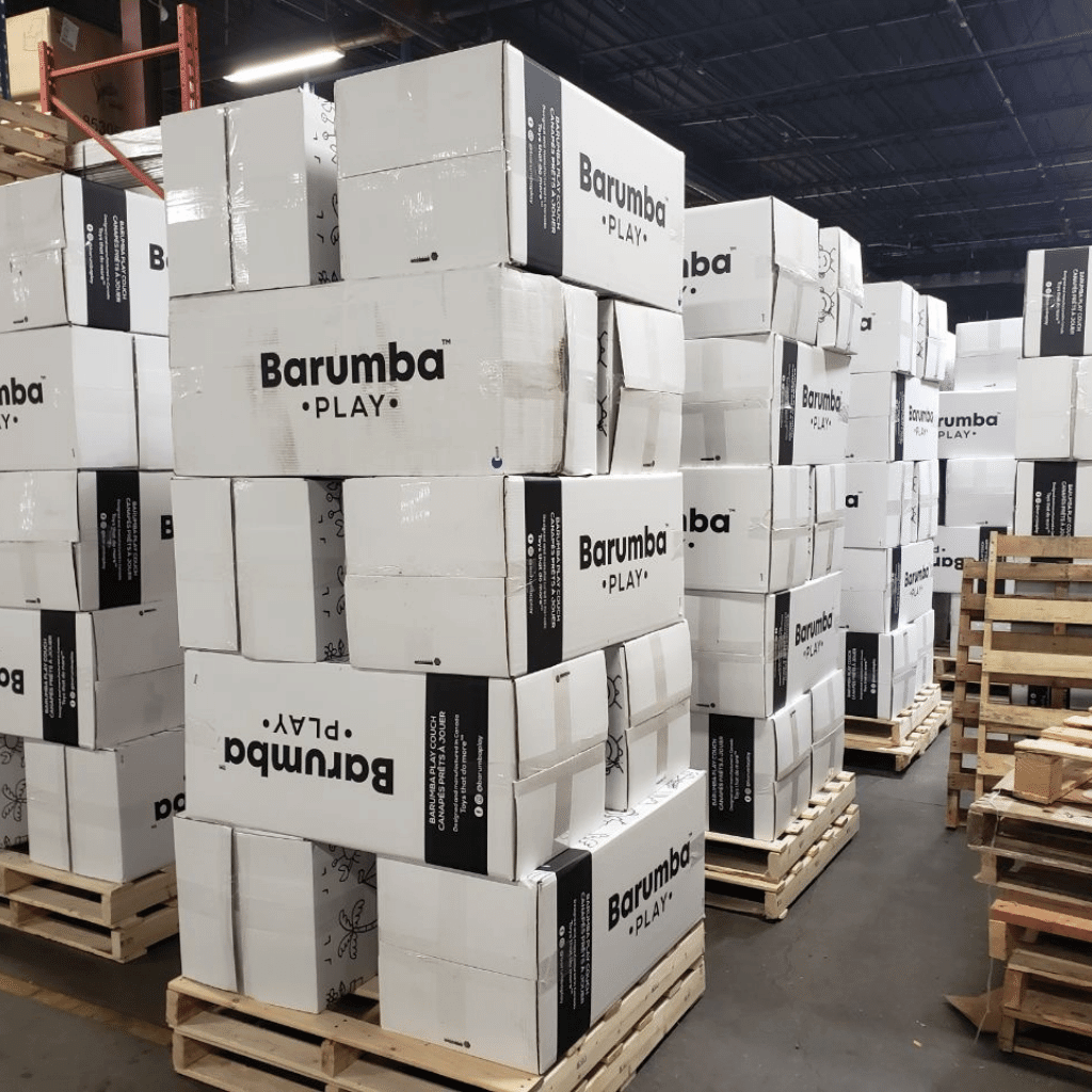 stacks of boxes of barumba play couches